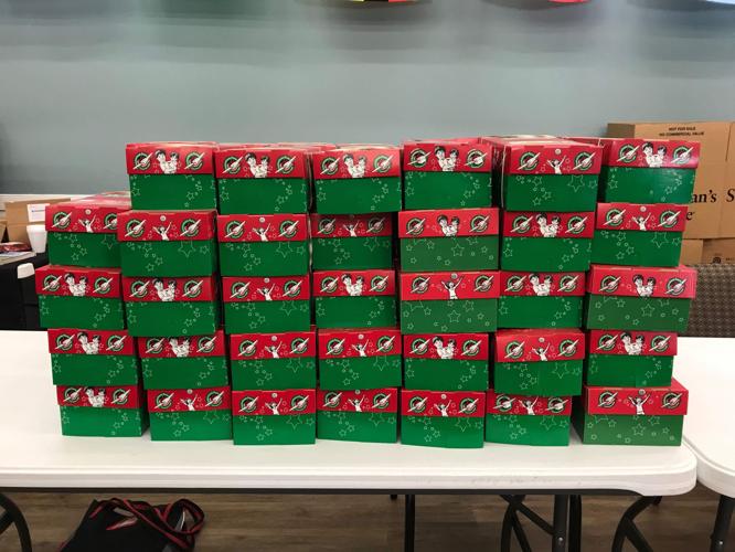 Tangipahoa Volunteers for Family and Community fills shoeboxes for