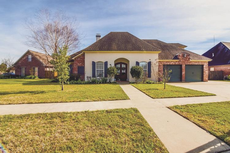On the cover Acadiana Homes Featured Home 105 Fountain View, Youngsville, Copper Meadows Real