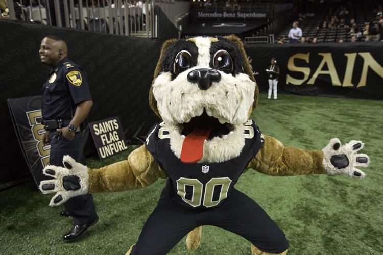 New Orleans Saints mascot Gumbo greets fans arriving to watch