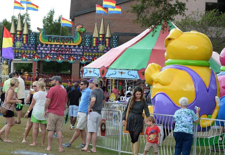 Flying horses, sliding dads, rolling dragons at St. Fair