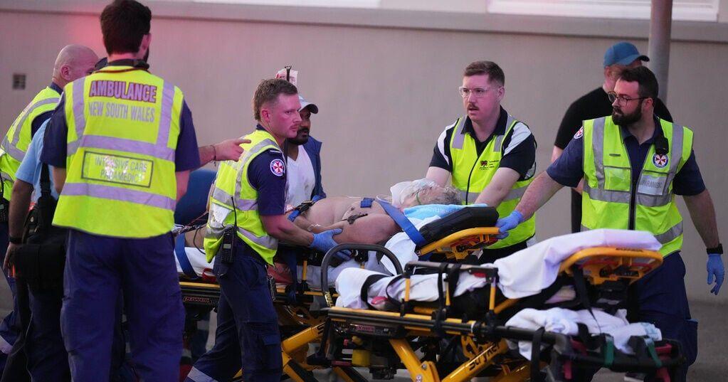 Gunmen kill at least 11 people in attack on Jewish holiday event on Sydney beach
