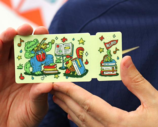 limited edition library card Lafayette Parish cards Burton Durand New York's hottest summer accessory.