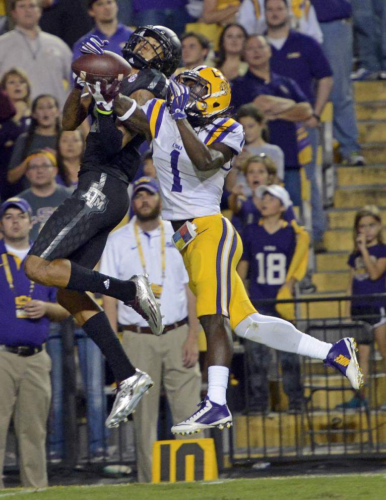 Photos: Wild, wacky, emotional game day ends with victory, LSU coach Les Miles carried off field by players _lowres