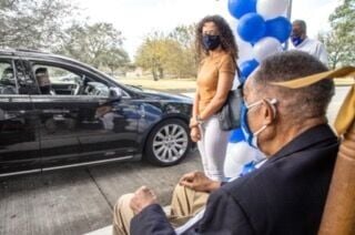 Dr. Norman Francis leads the drive through