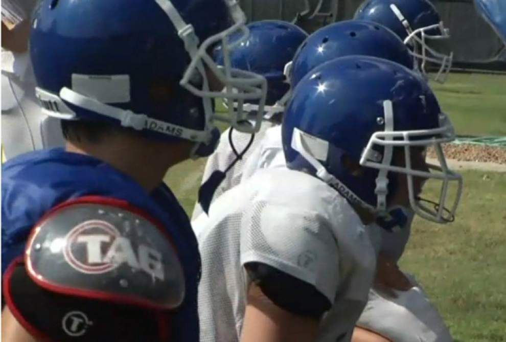 Researcher testing on-field concussion scanner _lowres