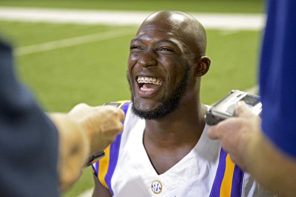 Leonard Fournette takes it all in stride at LSU football media day _lowres