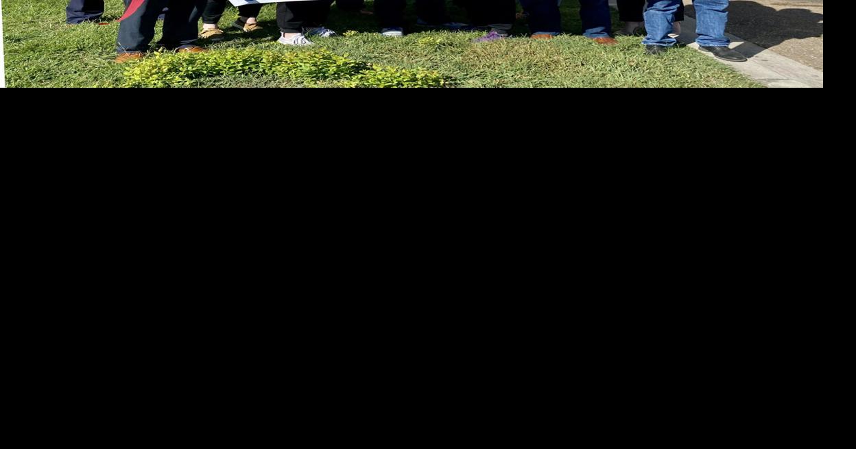 Husband and wife dentists hold ceremony for their practice Zachary