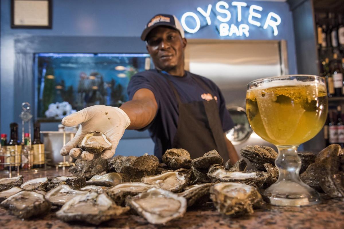 At the standup oyster bars of New Orleans, the best seats in the house