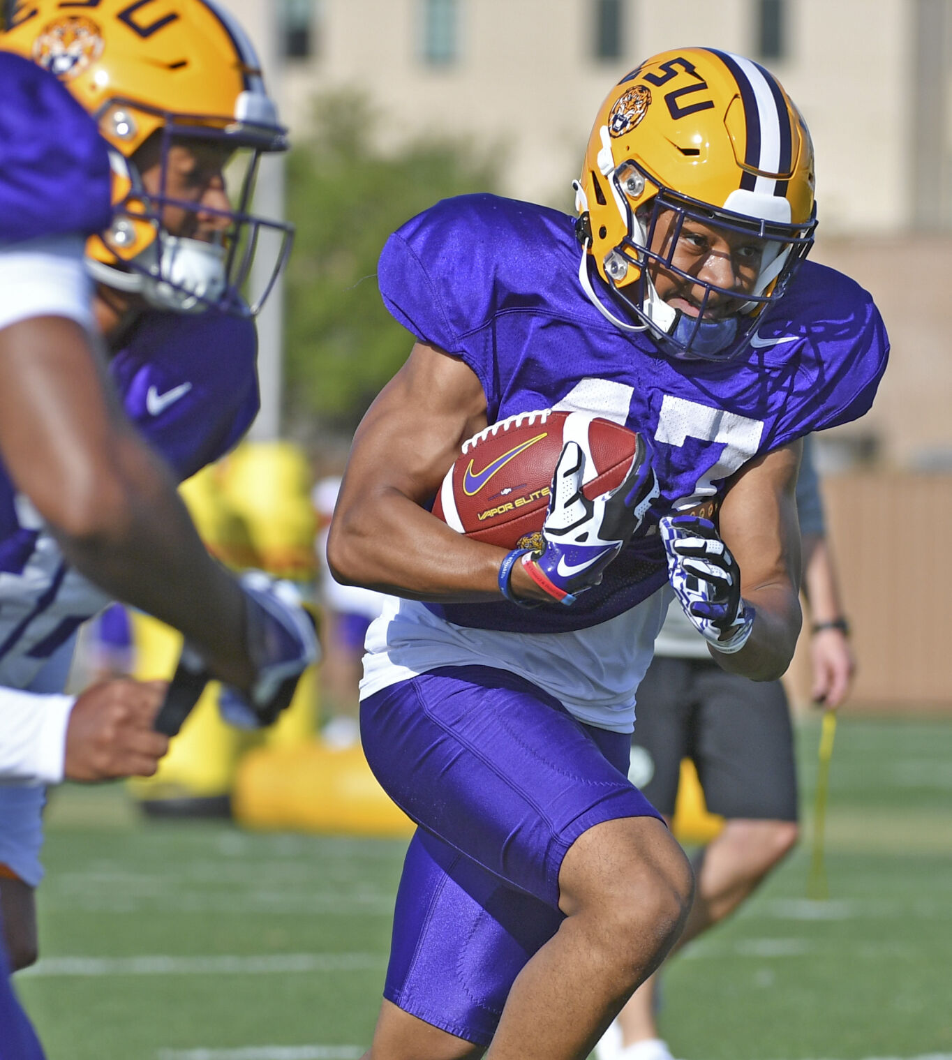 Tyrann Mathieu shows his support for LSU's Greg Brooks during