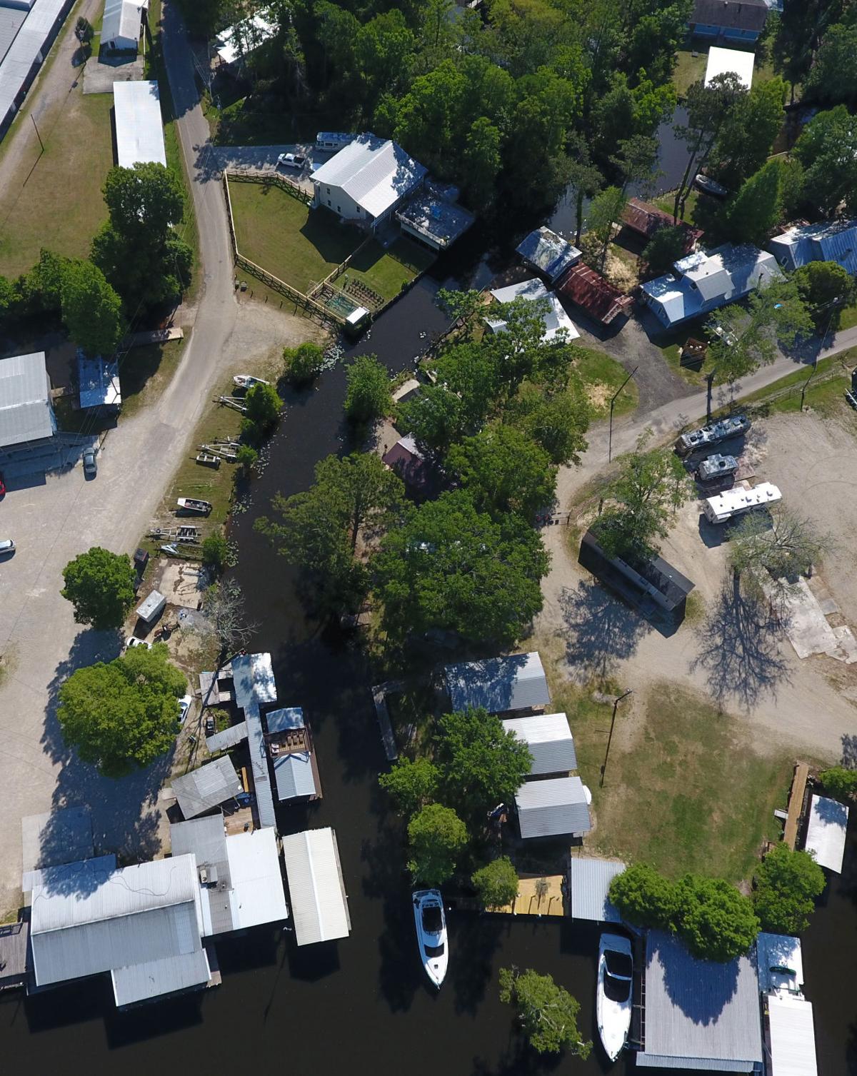 On Louisiana's bayous, houseboat living is cheap and easy but changes are in the works