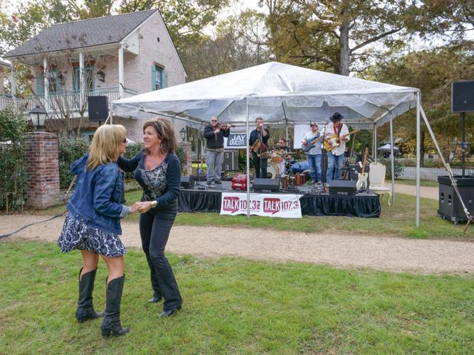St. Francisville Food and Wine Festival visitors dance, dine, during