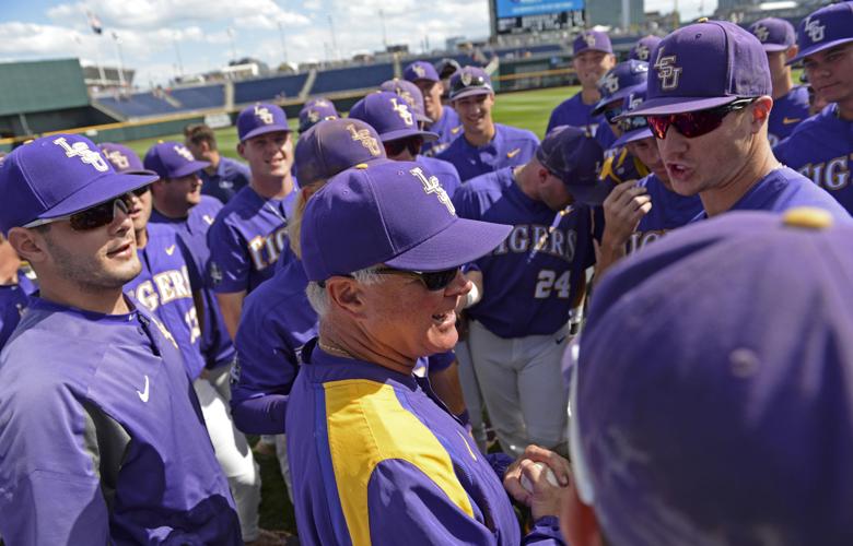 LSU's Greg Deichmann (7) is tagged out by Arkansas short stop Jax