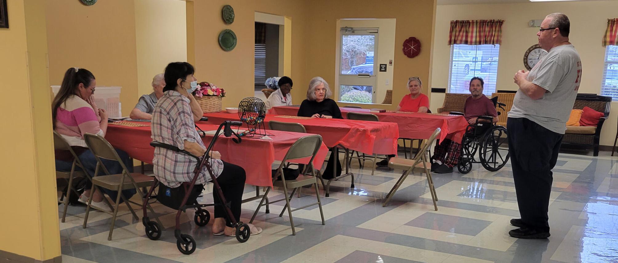 Assisi Heights residents celebrate February and learn fire safety St