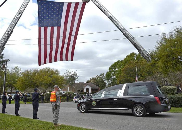Guardsman’s body transferred to Lafayette cemetery News