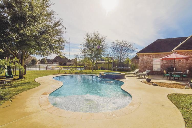 On the cover Acadiana Homes Featured Home 105 Fountain View, Youngsville, Copper Meadows Real