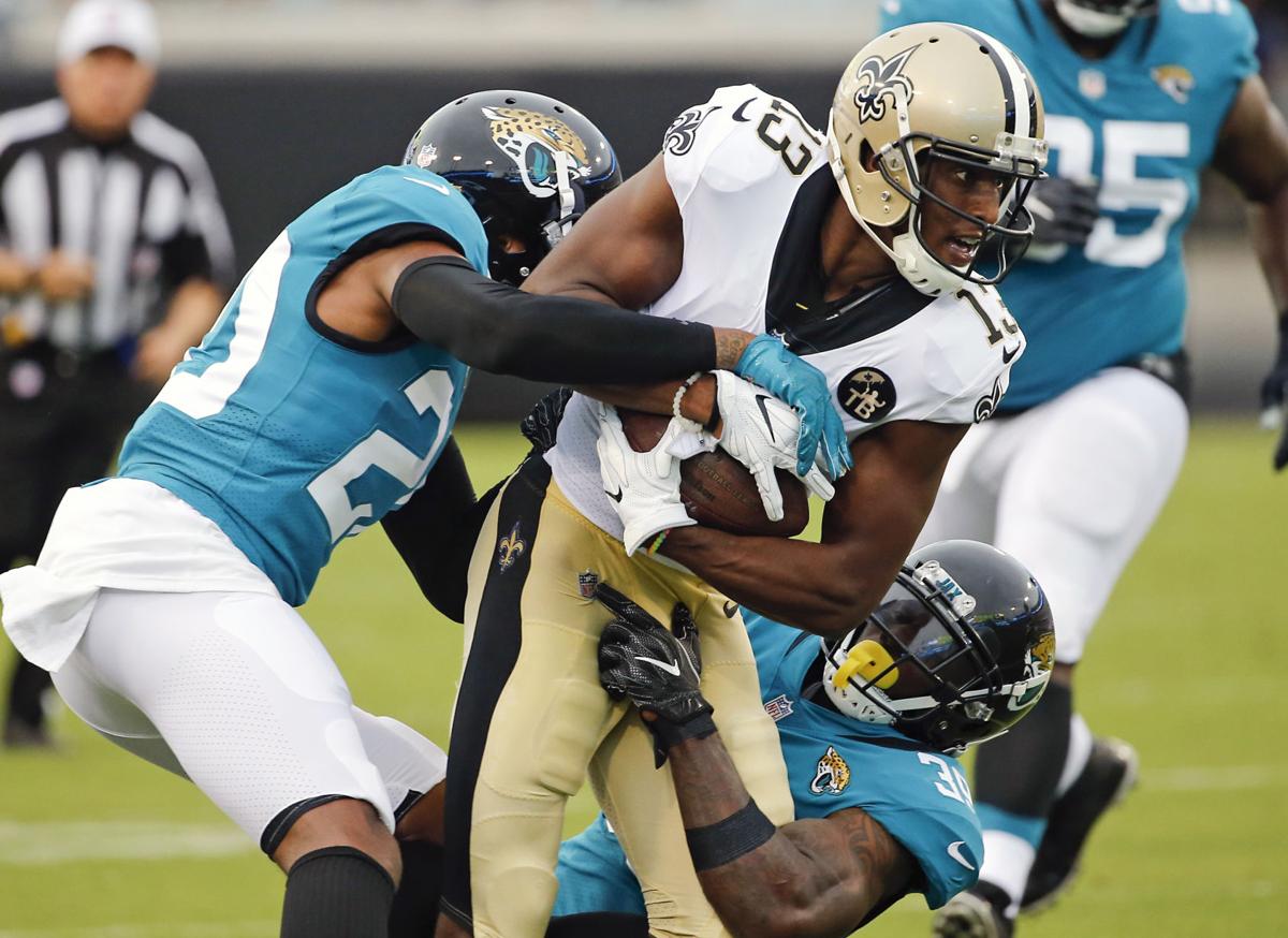 APTOPIX Saints Jaguars Football