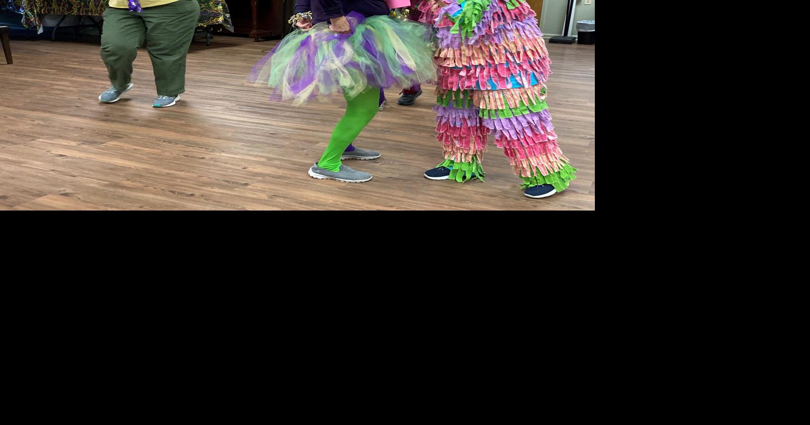 Mardi Gras returns to Gonzales Senior Center, beads fly, tiny floats