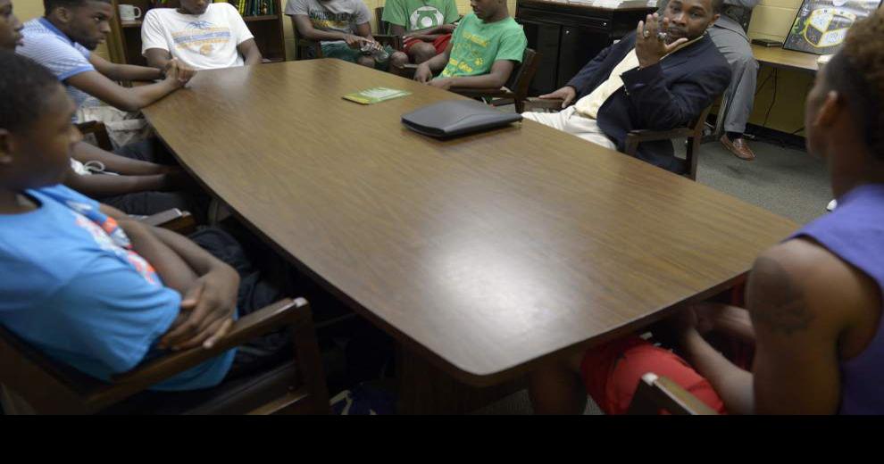 Clark returns home to coach boys basketball at Southern Lab High