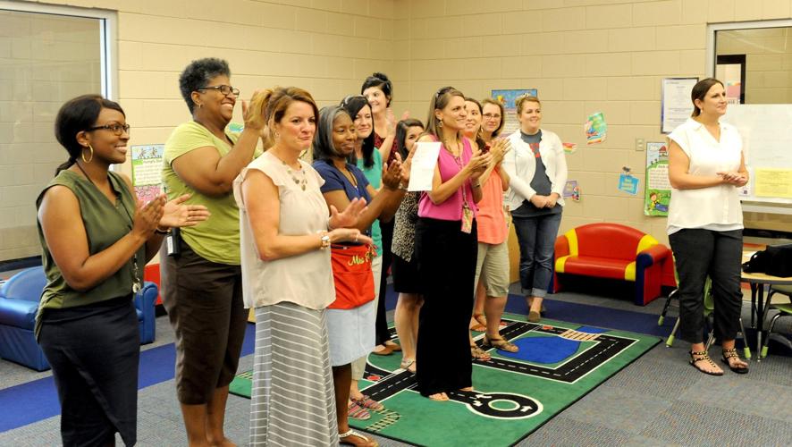 Rotary District 6200 donates sets of books to school districts