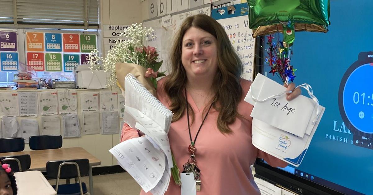 Teacher Raphael Zoe Ange, teacher at Dr. Raphael A. Baranco Elementary School is ...