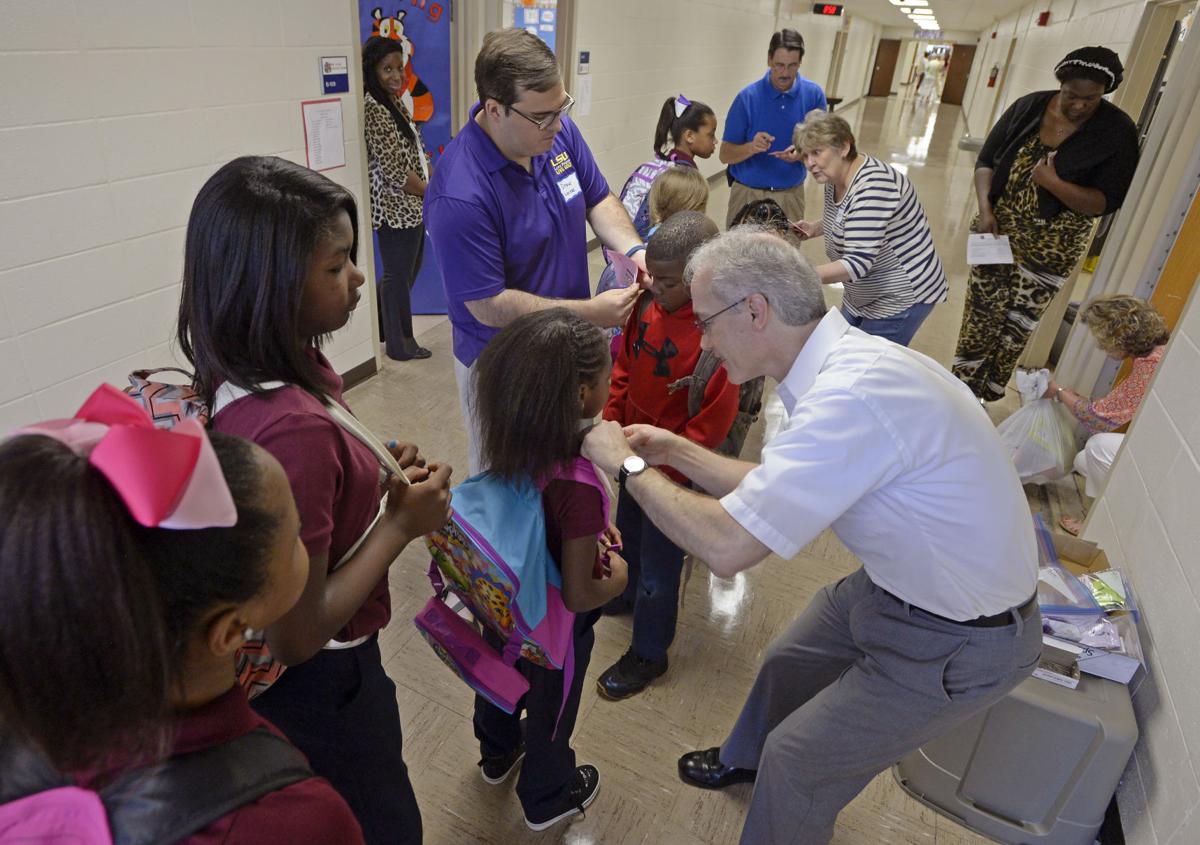 Students explore their new schools on Wednesday's first 