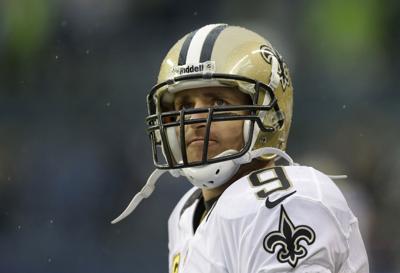 EXCLUSIVE: Meet Saints quarterback Drew Brees, get signed helmet