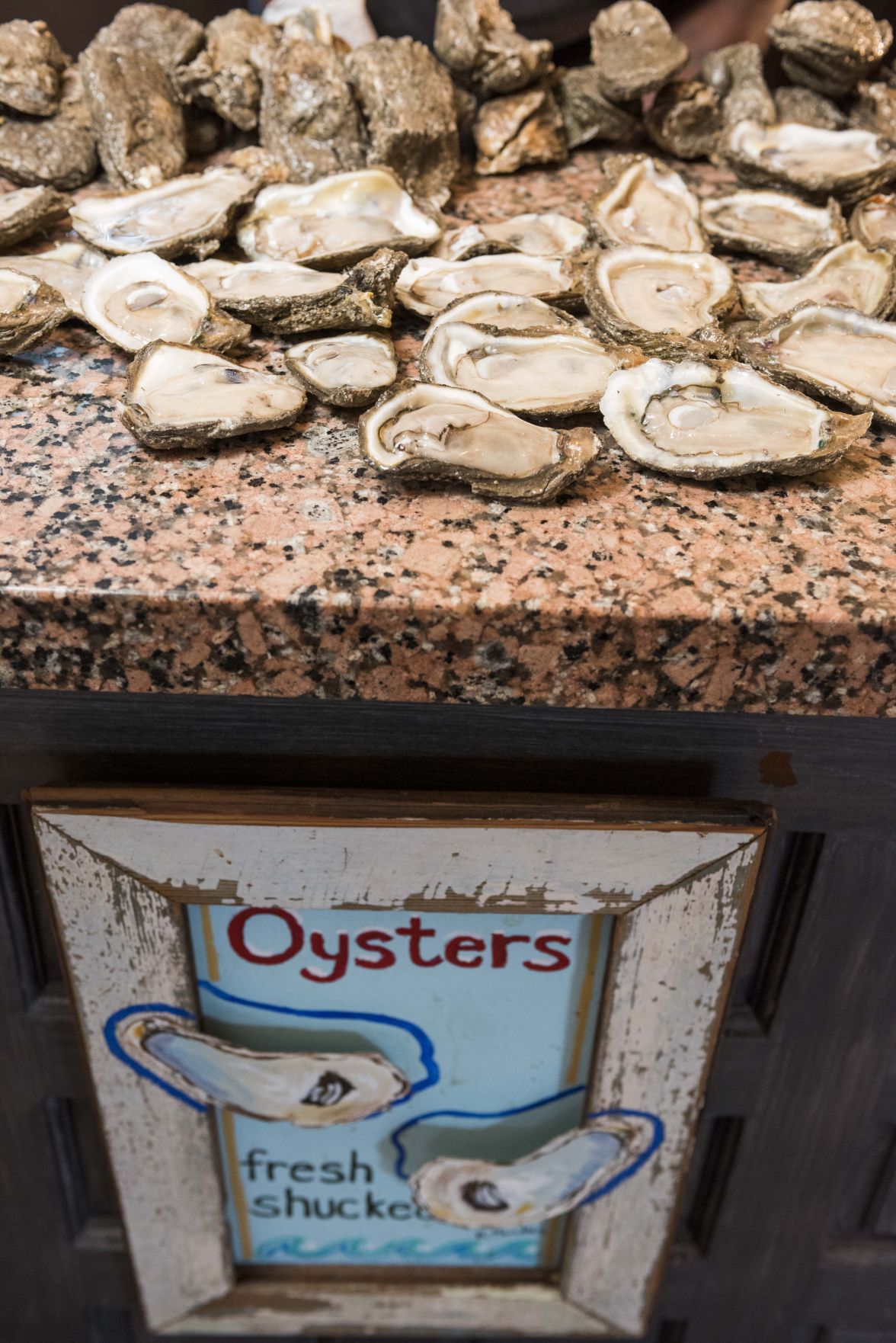 At the stand-up oyster bars of New Orleans, the best seats in the house