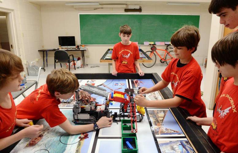 Six middle school sciencesavvy kids to bring their robot to First Lego