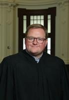 A ����h justice voted on a challenge to a law he helped write. Should he have stepped aside?