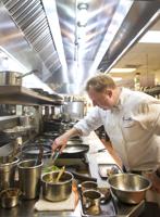 Chef Tory McPhail cooking at Commander's Palace