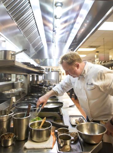 Chef Tory McPhail cooking at Commander's Palace