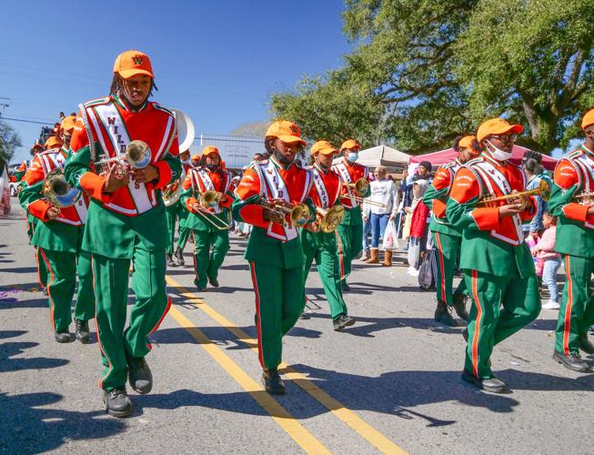 Carnival returns to Clinton as Mardi Gras parade rolls through town