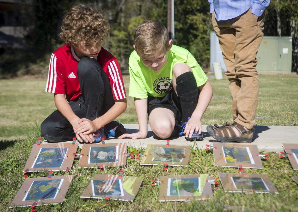 Photos: Bluebonnet Swamp hosts kids event showing how to make cyanotype prints _lowres
