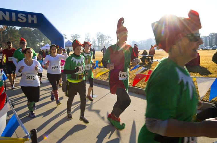 Santa’s ‘elves’ race through the streets of Central in festive 5K run ...