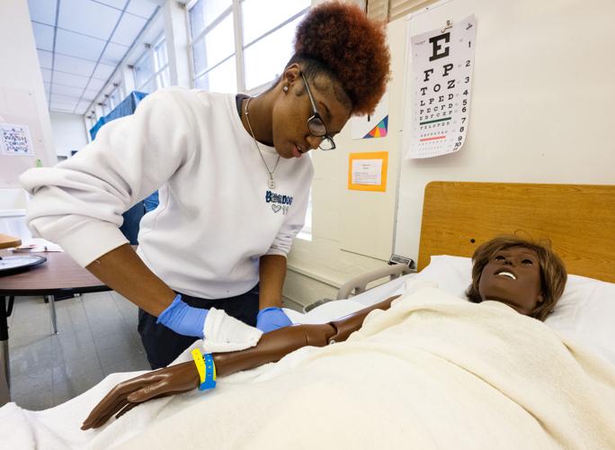 What programs are offered at the Lafayette Career Center? Education