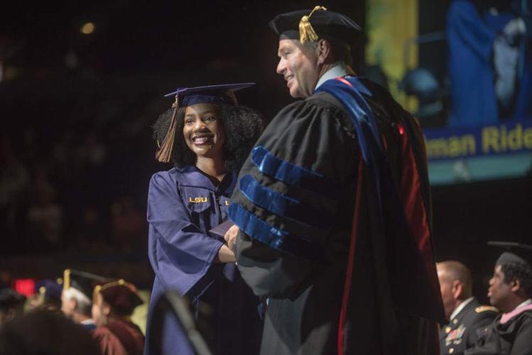 Photos Summer heat doesn't stop these LSU graduates from donning their