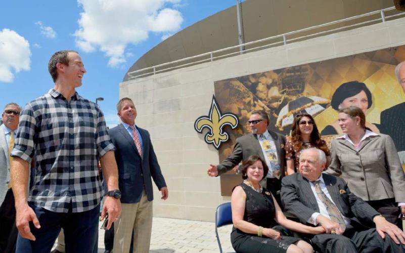 Saints unveil statue of Tom Benson at Superdome