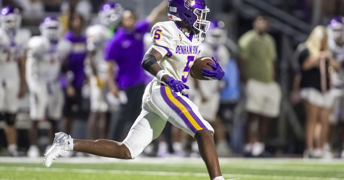 Denham Springsโ quarterback runs into tight defense of Central High, but has good moments