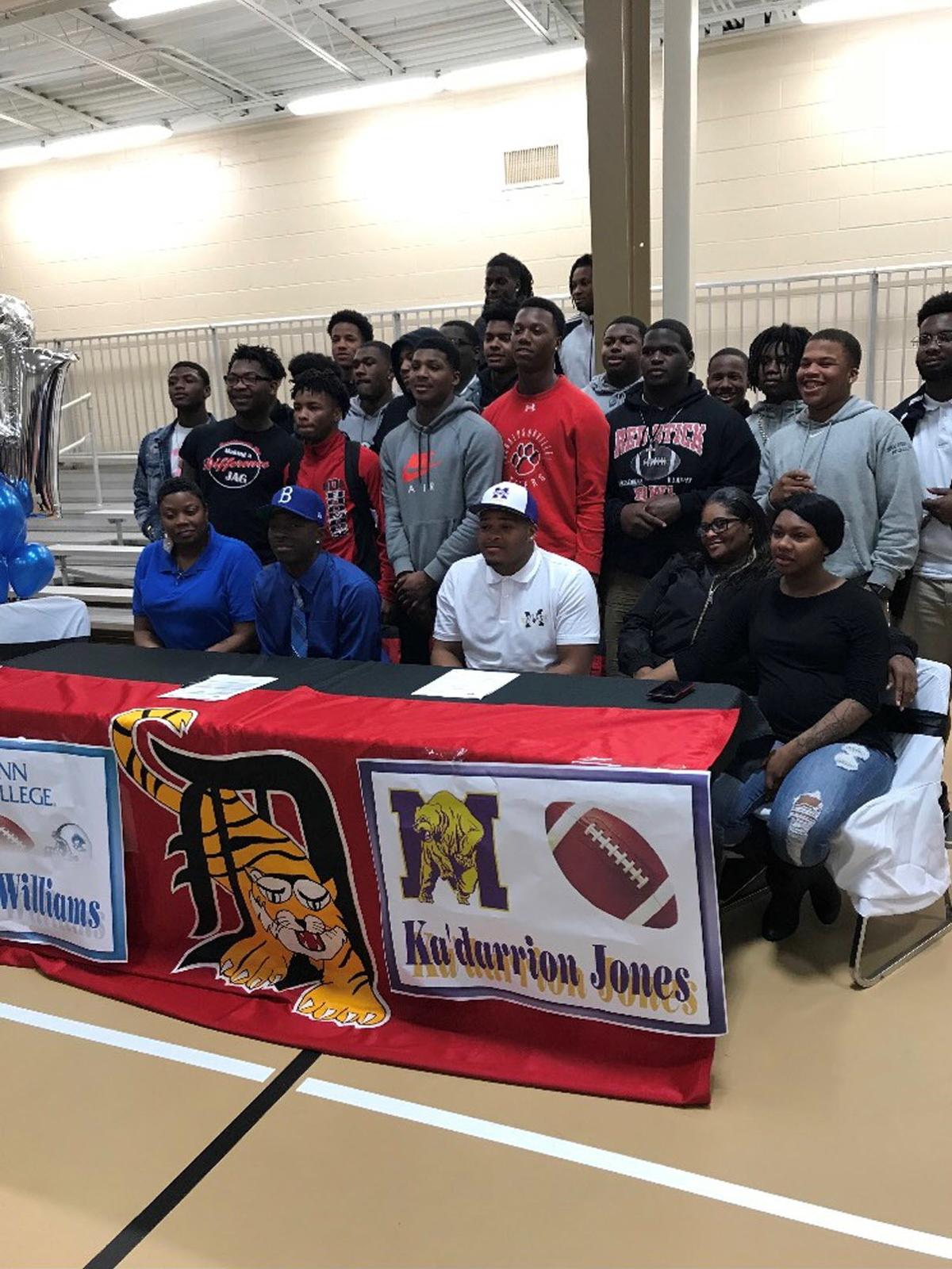 donaldsonville high football players sign letters of intent during