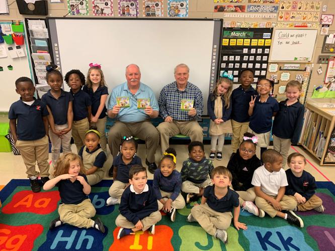 Kiwanis Club donates books; volunteers read to Zachary Early Learning