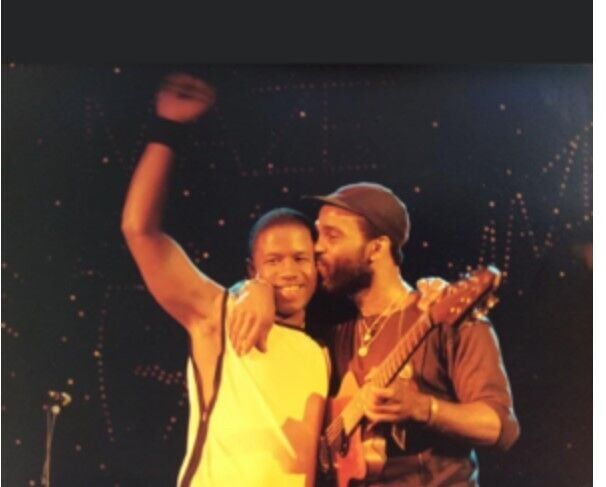 Frankie Beverly on stage with son Anthony Beverly