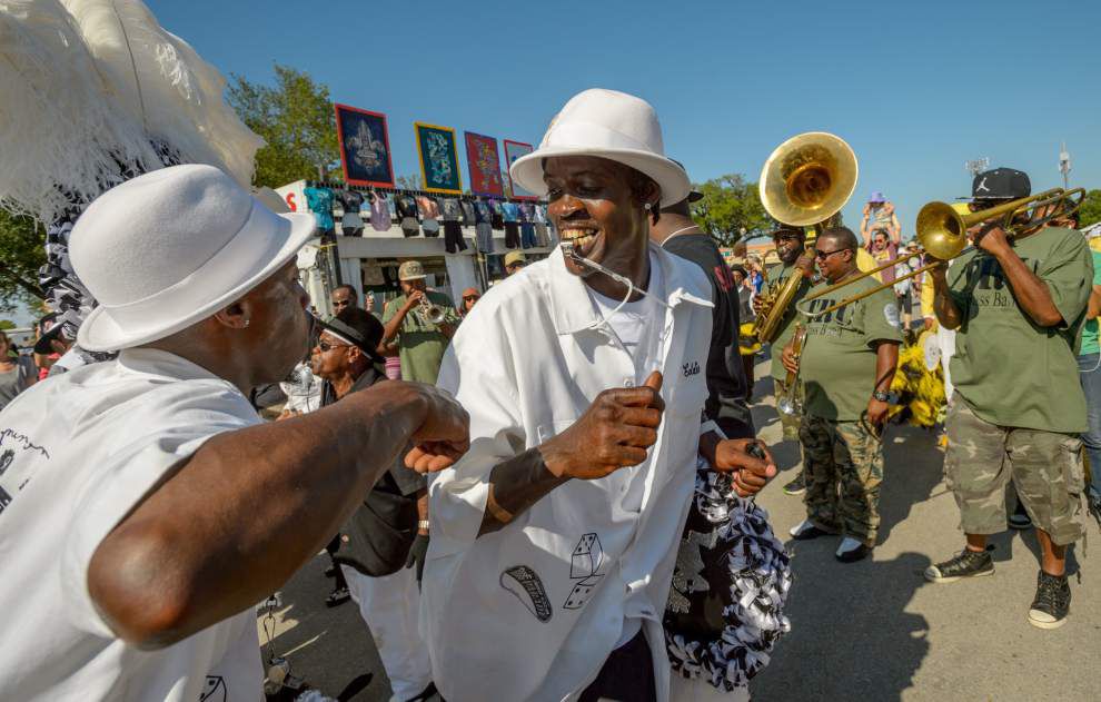 PHOTOS: Cloudy skies turn to colorful tunes, somber memories at opening day of New Orleans Jazz Fest 2016 _lowres