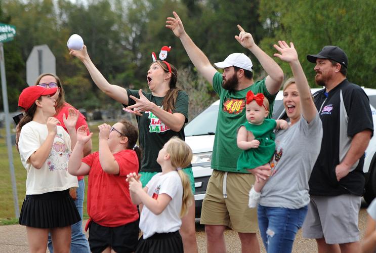 Bands, floats, horses join Santa for Walker Christmas parade