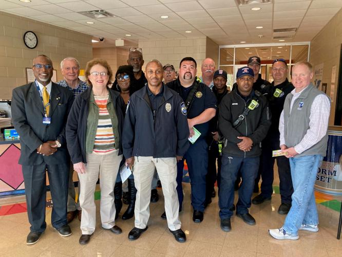 Kiwanis Club donates books; volunteers read to Zachary Early Learning