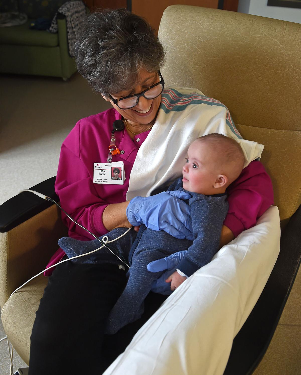 Aww! Inside the job of a baby cuddler, who snuggles Baton Rouge's