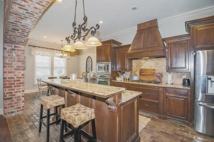 On the cover Acadiana Homes Featured Home 105 Fountain View, Youngsville, Copper Meadows Real