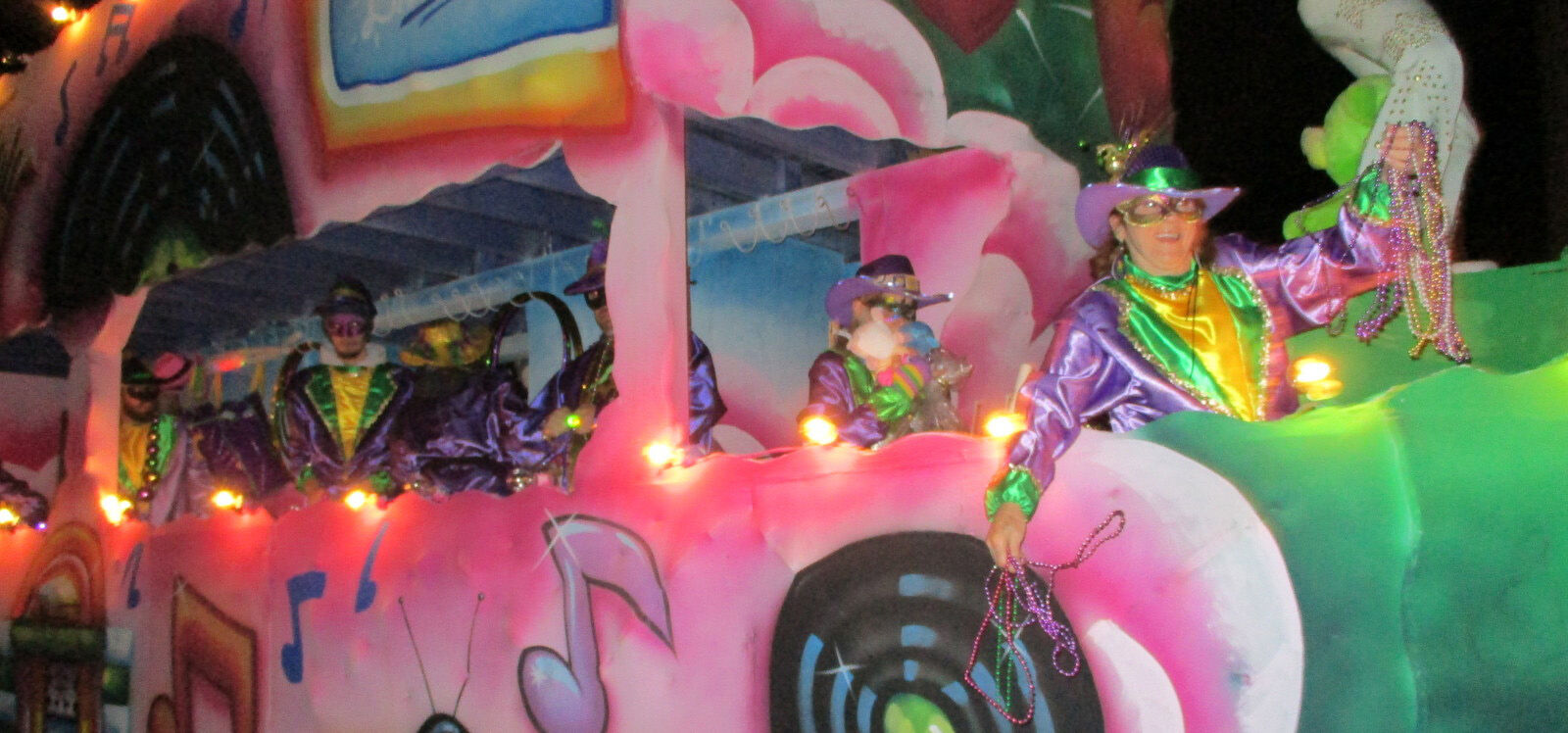 Colorful floats roll in Krewe of Omega s parade Livingston