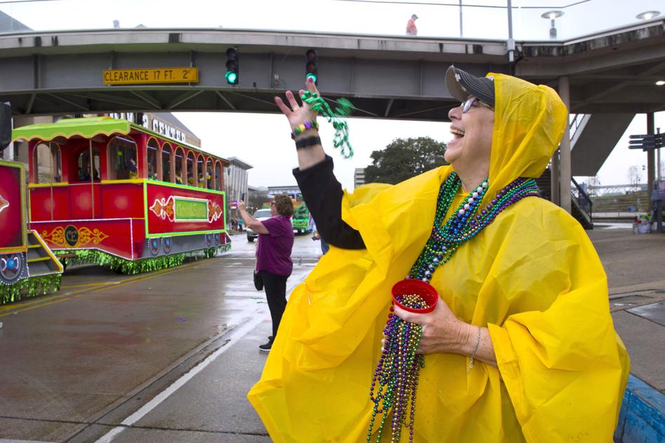 Storms pop up, temperatures go down, but Mardi Gras parades still roll