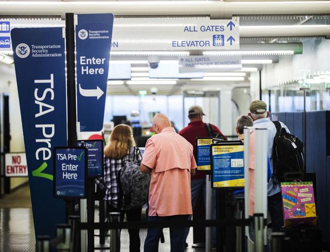 Summer spike, overlapping departures causing missed flights, long TSA