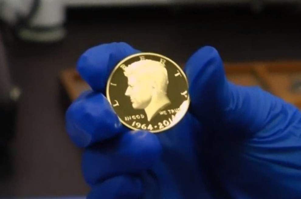 Mint gives JFK coin a facelift _lowres